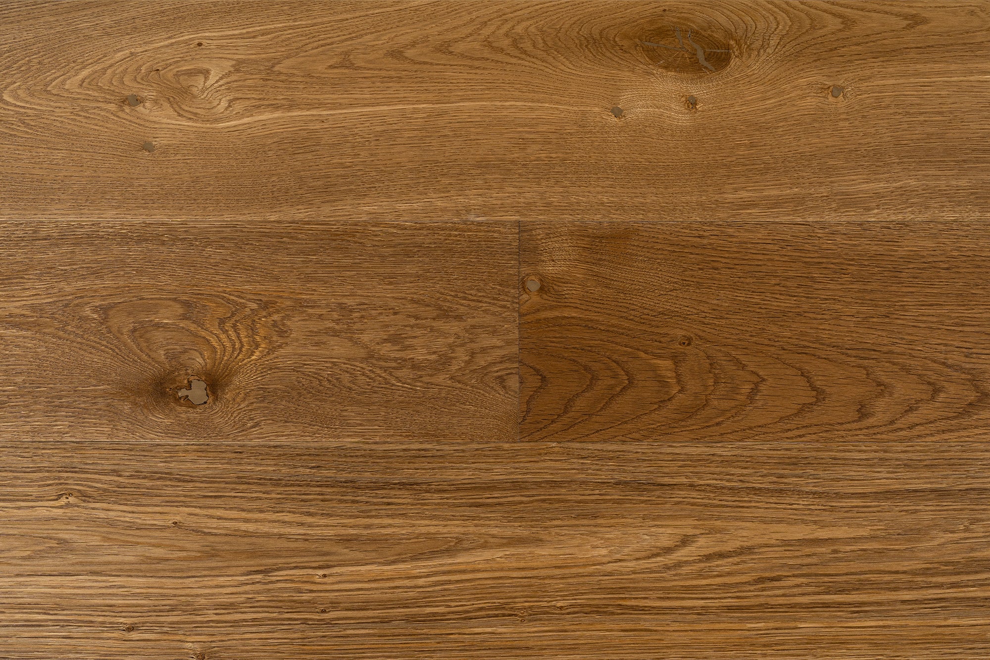 CC 25 high-end wide plank engineered European Oak refined hardwood flooring surfaces with a natural hardwax oil finish by Plank & Co - close up image