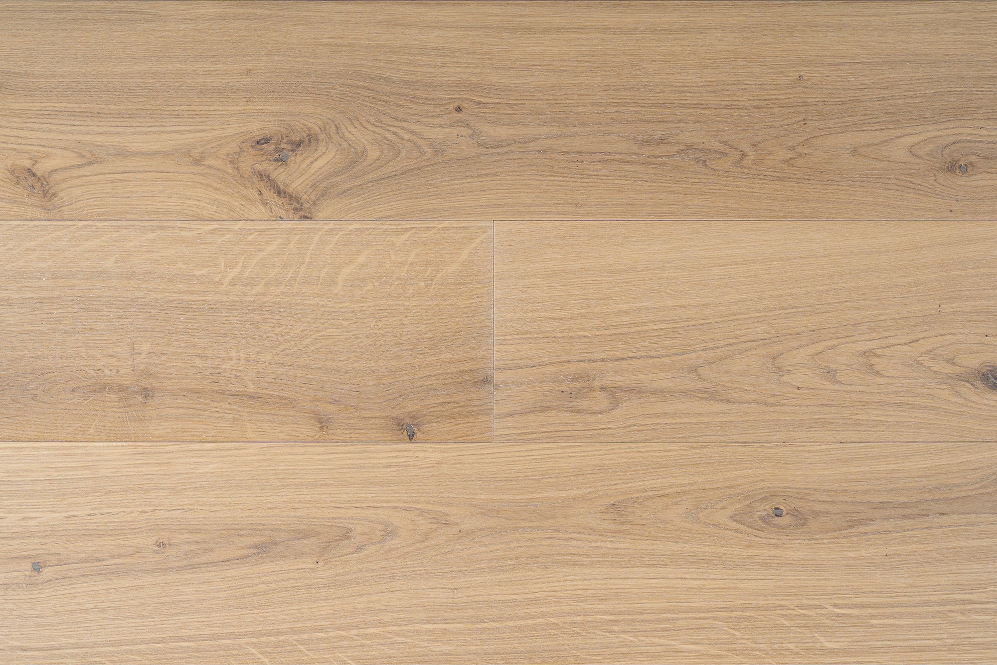 EA 60 high-end wide plank engineered European Oak refined hardwood flooring surfaces with a natural hardwax oil finish by Plank & Co - close up image