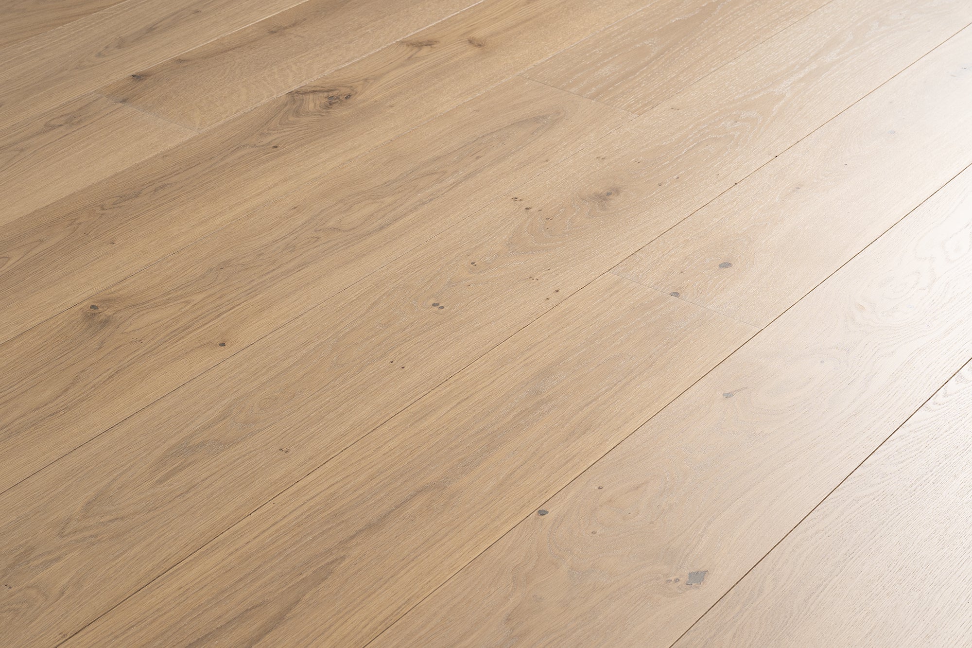 EA 60 high-end wide plank engineered European Oak refined hardwood flooring surfaces with a natural hardwax oil finish by Plank & Co - textured image