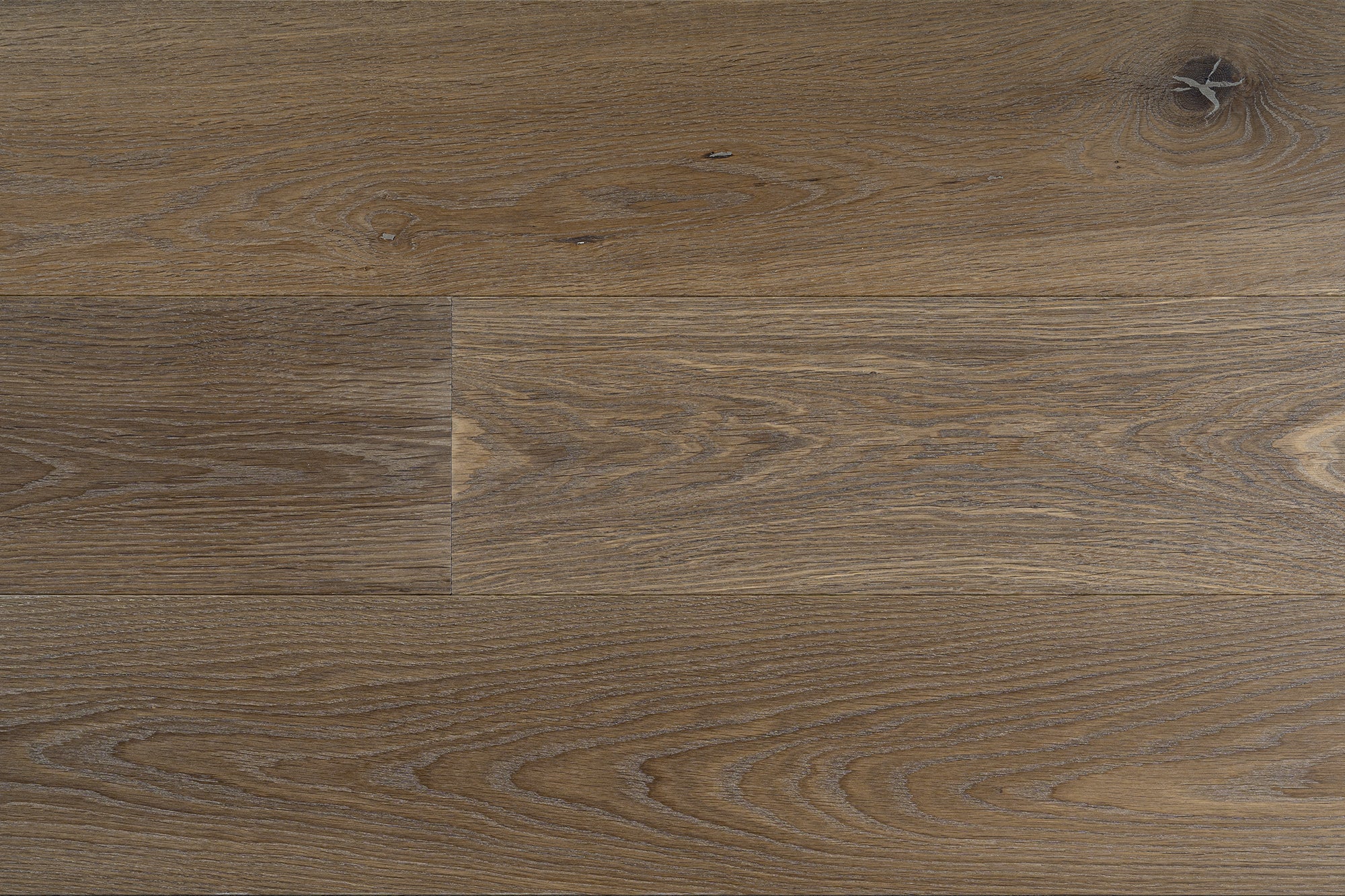 HZ 42 high-end wide plank engineered European Oak refined hardwood flooring surfaces with a natural hardwax oil finish by Plank & Co - close up image