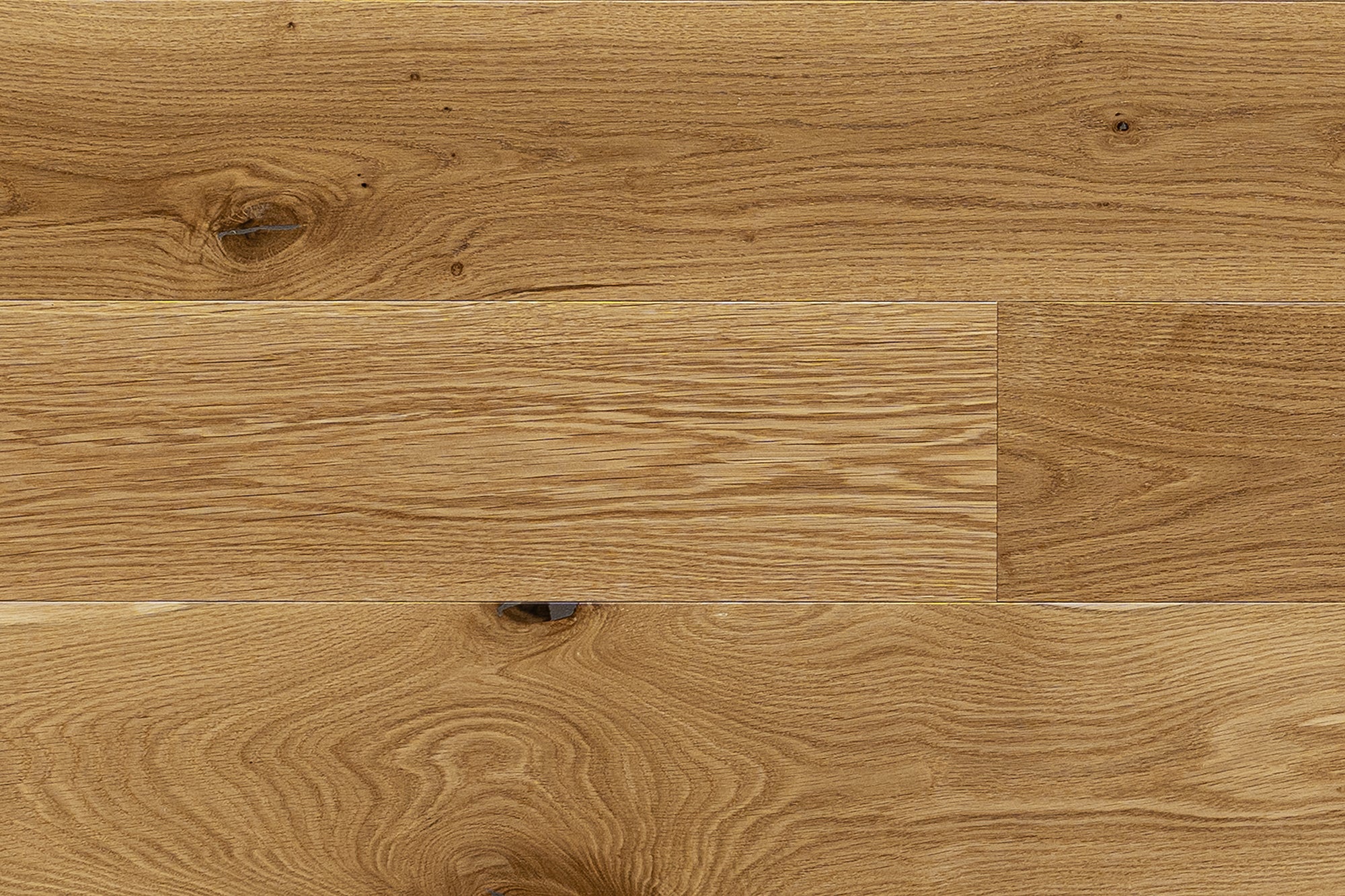 NT 38 high-end wide plank engineered White Oak Canadian made refined hardwood flooring surfaces with a natural hardwax oil finish by Plank & Co - close up image