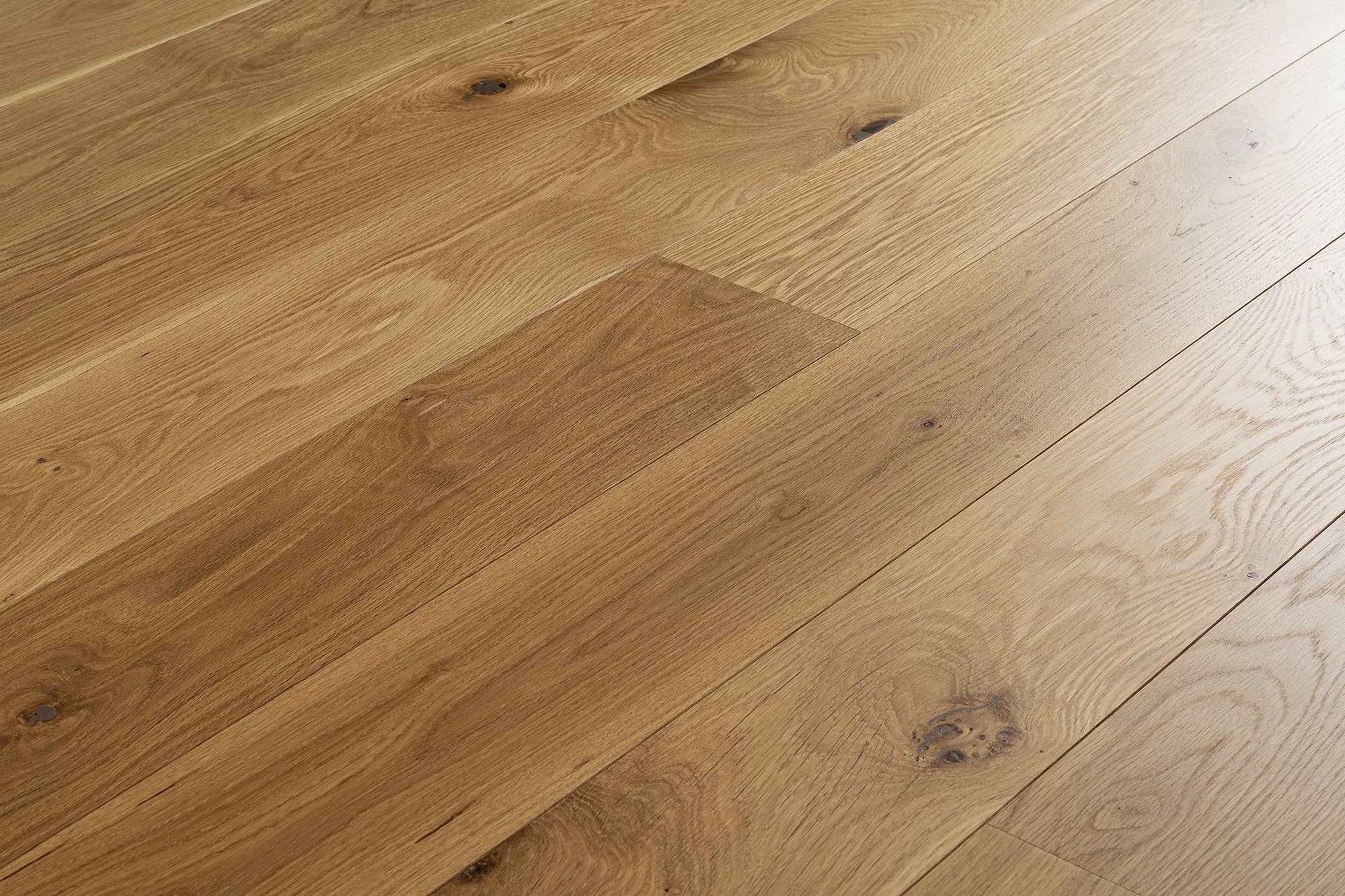NT 38 high-end wide plank engineered White Oak Canadian made refined hardwood flooring surfaces with a natural hardwax oil finish by Plank & Co - textured image